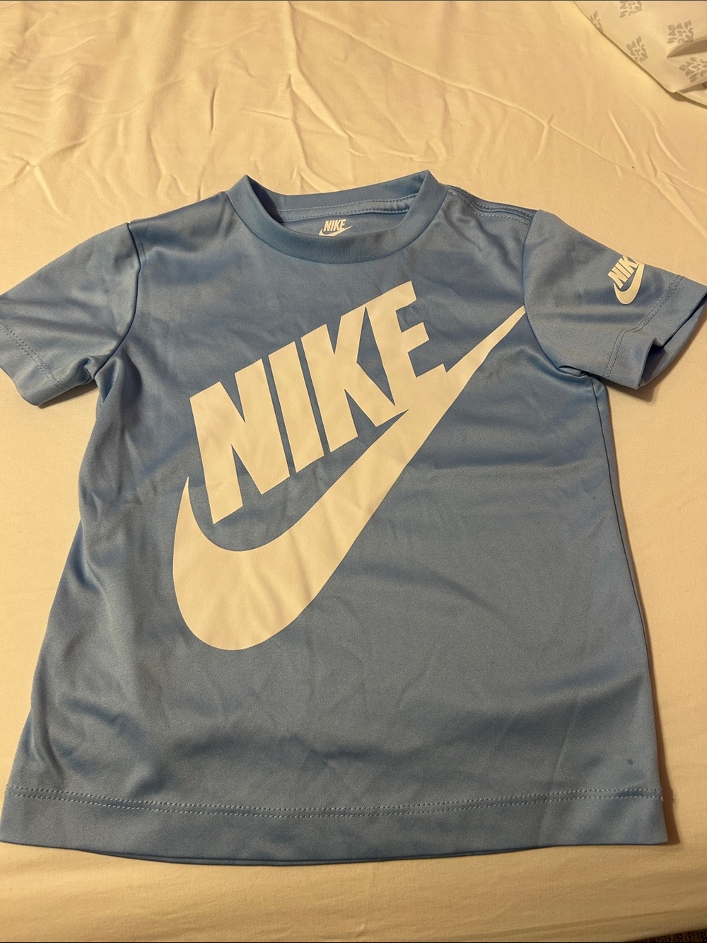 Nike Light Blue Short Sleeve Tee with White Swoosh Logo